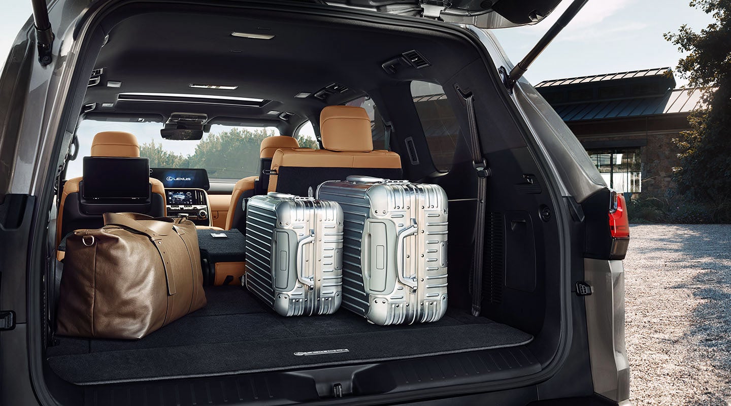 Detail shot of the open trunk of the 2022 Lexus LX 600 with luggage. | Fox Lexus of El Paso in El Paso TX