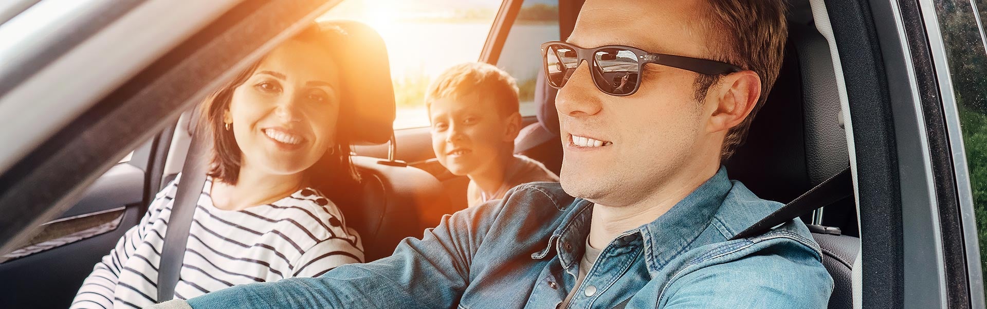 family in car